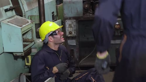 Factory Worker Injured By Accident While Using Machine in Factory