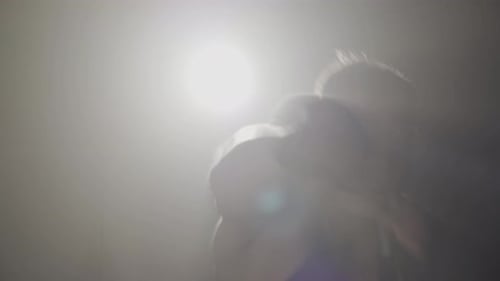 Front View of Man Boxing Camera in Lense Flare. Close-up Portrait of Confident Strong Caucasian