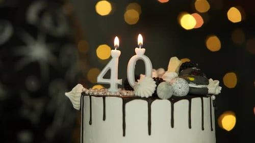 Delicious Birthday Cake with Candles Celebrating Forty Years