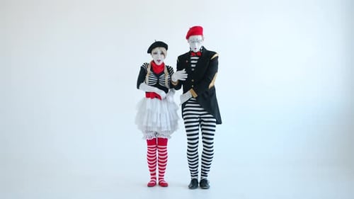 A Male and Female mime perform together