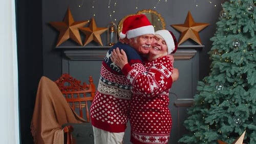 Senior Couple Embracing at Christmas Time