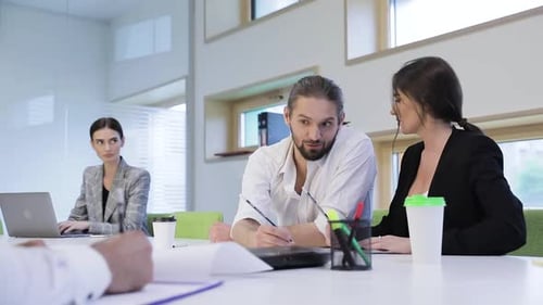 Work In Office. Business People Working And Talking At Office