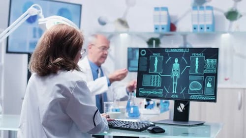 Scientists Working in Futuristic Lab with Body Analysis