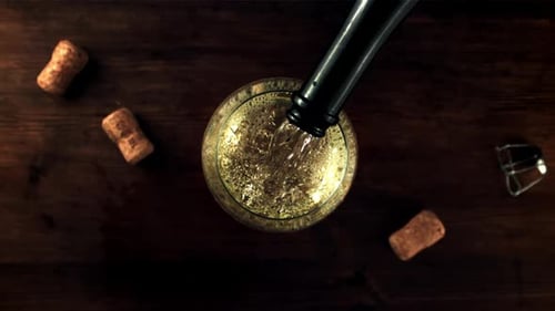 Champagne Being Poured into Glass from Above