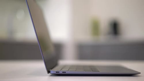 Person Closes the Laptop