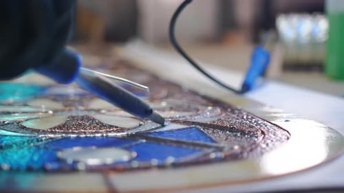 Closeup Soldering of Stained Glass Seams
