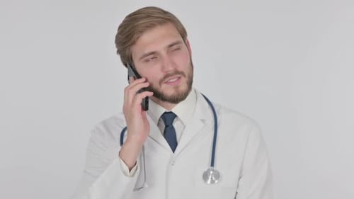 Male Doctor Talking on Cellphone