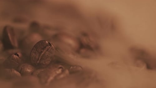 Coffee Beans with Drifting White Smoke