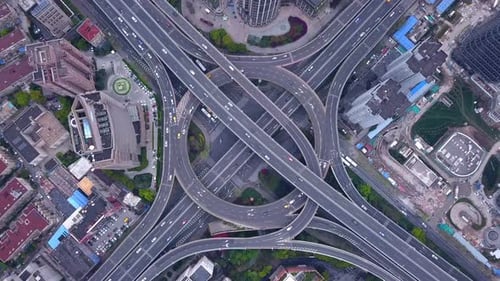 Time lapse of highway junctions with roundabout. Bridge roads in urban city, Shanghai.