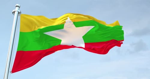 Realistic Waving Flag of Myanmar Against Blue Sky Loop