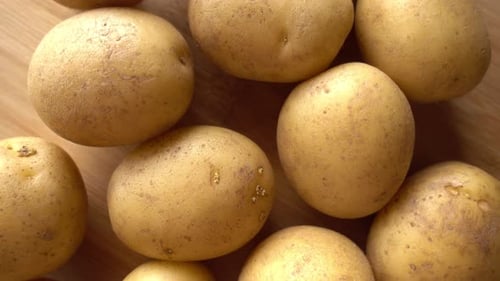 Close Up of Potatoes on Wooden Surface
