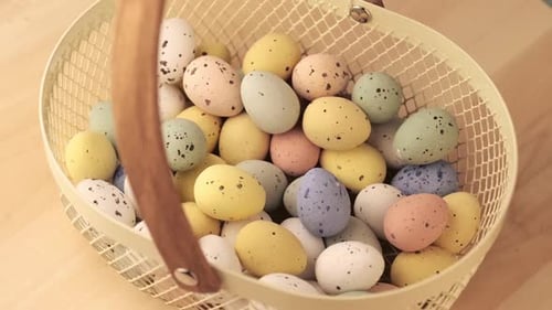 Easter Basket Filled with Colorful Speckled Eggs