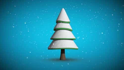 Snow falling on revolving fir tree