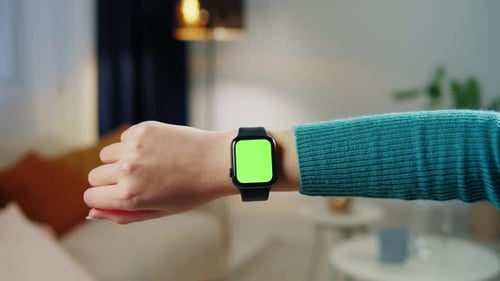 Woman Using Smartwatch with Chroma Key Closeup