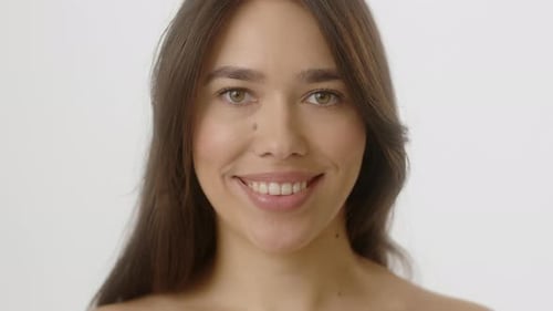 Smiling Brunette Woman Portrait on White Background