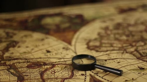 Antique World Map with Magnifying Glass