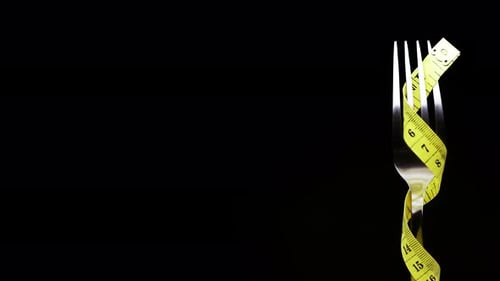 Fork Wrapped with a Measuring Tape Rotating