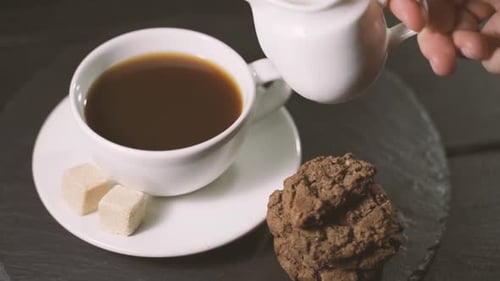 Slow Motion Closeup Steamed Milk Pour Into Cappuccino