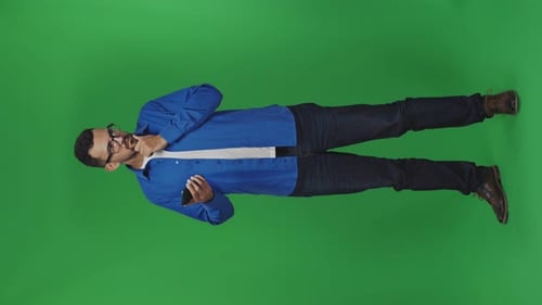 Full Shot of Man With Phone On Green Screen