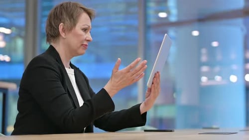 Woman Having a Video Call in an Office