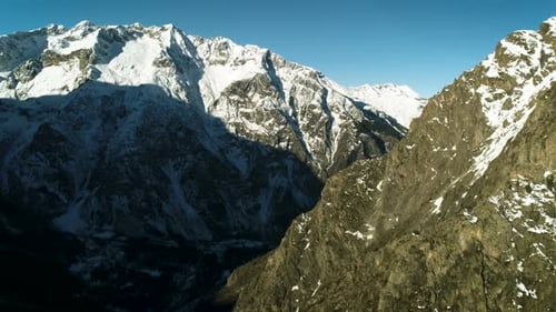 Snowy Mountain Range Aerial View in Winter