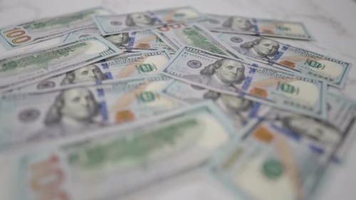 Pile of One Hundred Dollar Bills Close Up