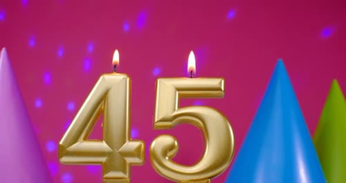 Golden Number Candles Burn for a 45th Birthday
