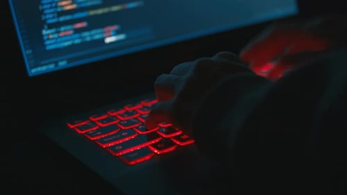 Programmer Coding At Night