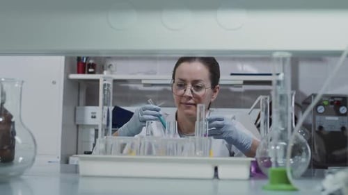 Researcher Working with Test Tubes in Lab