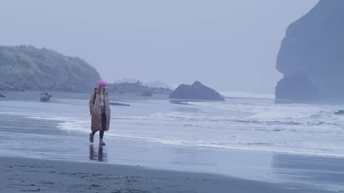 Slow Motion RED Camera Shot of Alone Attractive Woman Walking Oregon Coat Beach