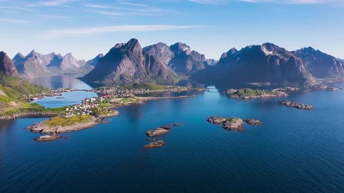 Flight over the sea and view on the fishing village Reine and Hamnoya ,Lofoten Islands,Norway