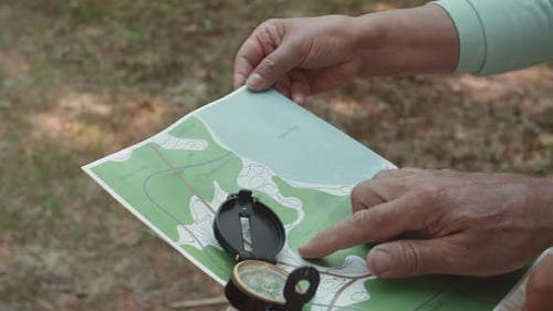 Close Up of Compass and Hiking Map