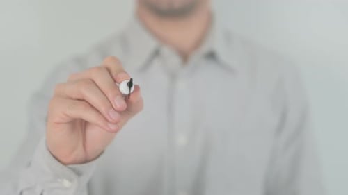Man Writes 'PROCESS' on Transparent Surface