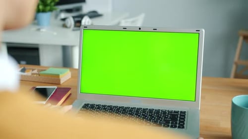 Close-up of Male Hands Using Green Screen Chroma Key Laptop Typing in Office