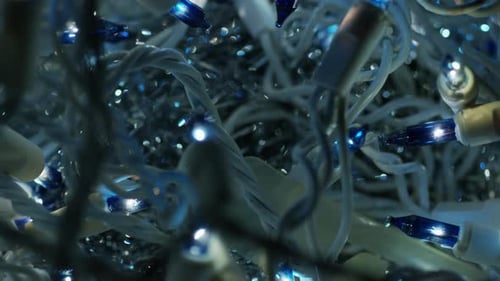 Tangled Blue Christmas Lights with Silver Tinsel