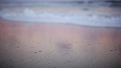 Close-up of surf on beach