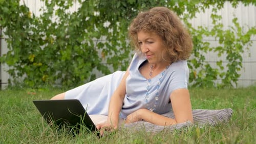 Lady with notebook working outdoor. Office outdoor, Working with notebook on fresh air