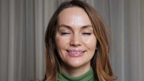 Woman Smiling with Braces Close Up