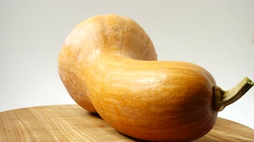 Rotating Gourd on a Wooden Surface