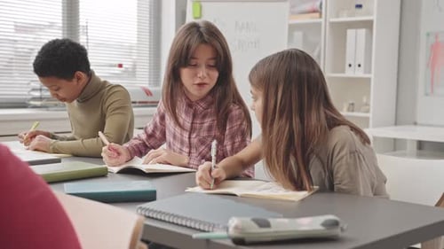 School Girls Chatting during Exam