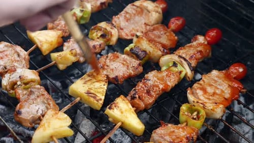 Delicious Meat and Vegetable Skewers Being Grilled
