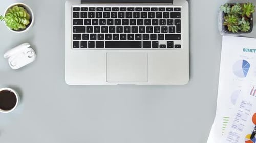 Woman hands typing on laptop top view Stopmotion