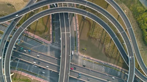 Top View to the Cars Driving on Multilevel Highway on the Sunset