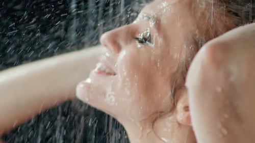 Closeup Face of Sensual Naked Woman Smiling Taking Shower