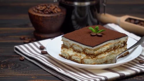 Delicious Tiramisu with Coffee Beans on Table