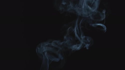 Wispy Blue Smoke Rising on Black Background