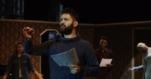 Actors Rehearsing in a Theater