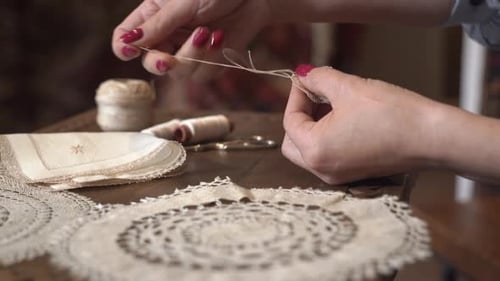 Woman Hand Sewing Beautiful Lace Textile