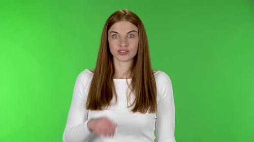 Young Woman Talking and Gesturing on Green Screen