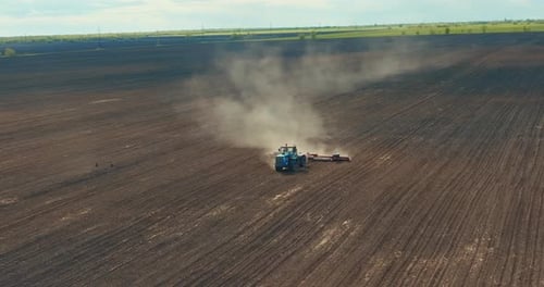 Mechanized Soil Plowing By Old Tractor View From Top Drone is Flying Above Fields Prores